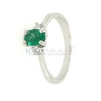 Oval cut emerald and diamond ring