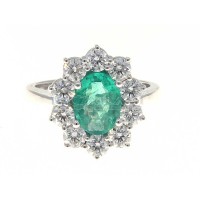 Anello con smeraldo e contorno di 10 diamanti